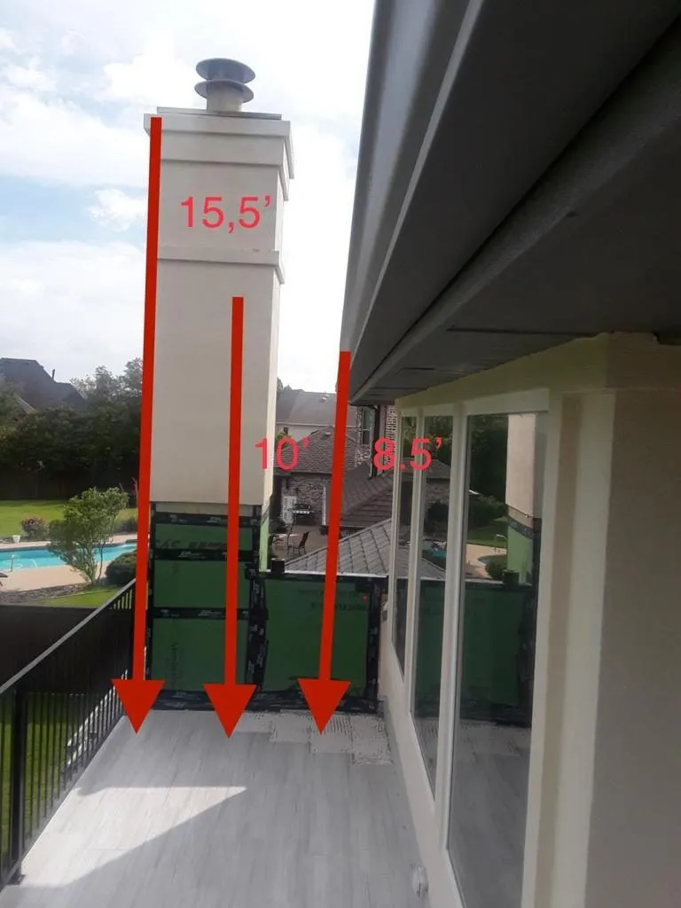 Annotated roof photo marking chimney height measurements in feet
